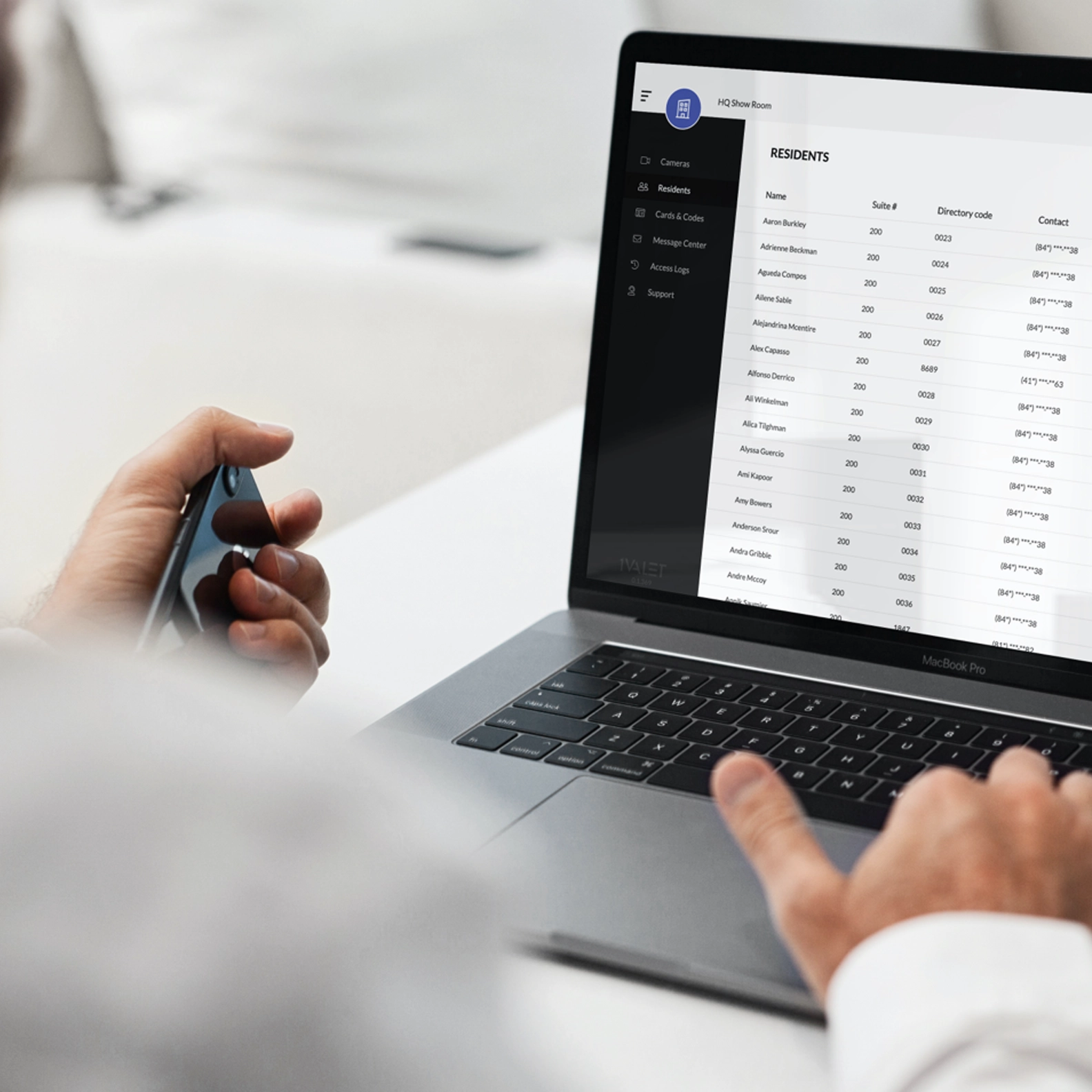 Unidentifiable person using a laptop