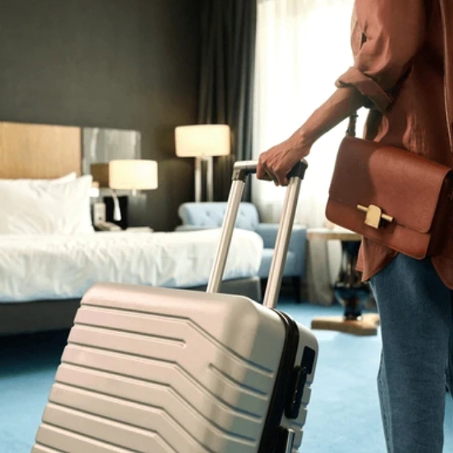 Guest carrying a suitcase